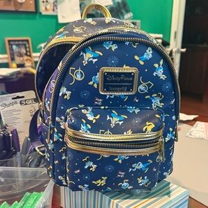 Loungefly 50th Anniversary Parks Backpack with Gold Accents